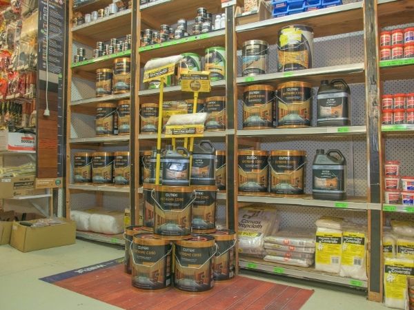 This image is a display of decking oil at Geographe Timber & Hardware, where they have all the Decking Accessories: Screws, Stains, and More