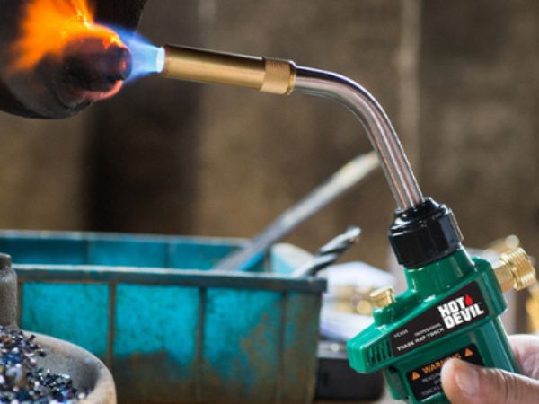 Branded graphic featuring Hot Devil torches and soldering tools used in workshop environments.