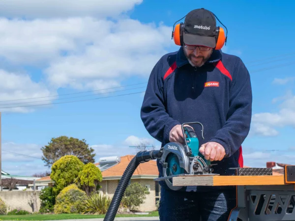 Matt from our Hardware Store demonstrating a circular saw to cut decking timber at Geographe Timber & Hardware.