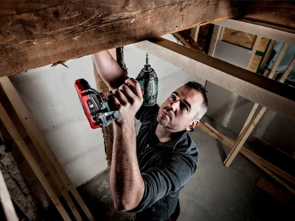 Metabo SSD 18 LTX 200 BL used overhead to drive a screw on site.